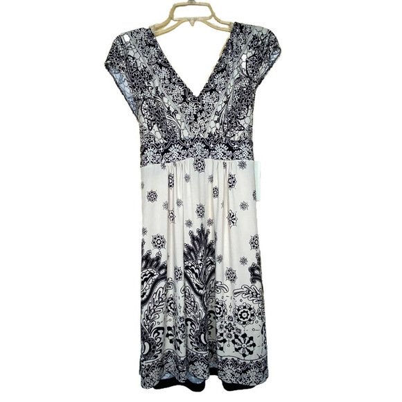 Ann Taylor Dresses & Skirts - TRULLI  Cream Black Print Sleeveless Wrap Dress 14